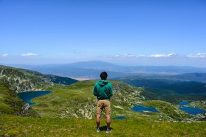 Man contemplating the Seven Rila Lakes in Bulgaria