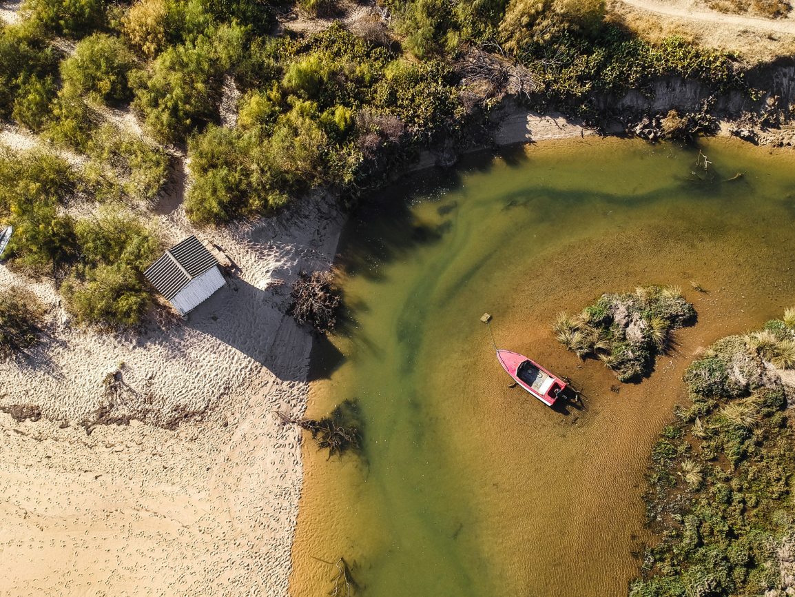 Ria Formosa and a pink boat seen from above