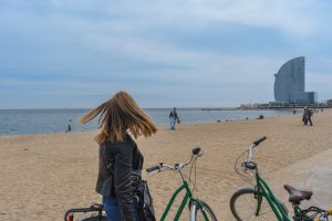 Stopping our bikes for a second to appreciate the beach air in Barcelona