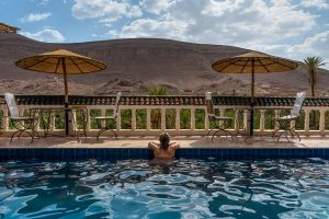 Maria at a pool in Fint Oasis